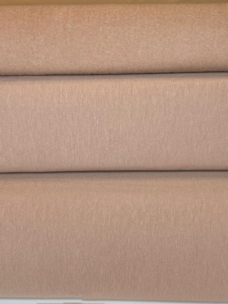 Double-sided looped fabric with fleece in beige color