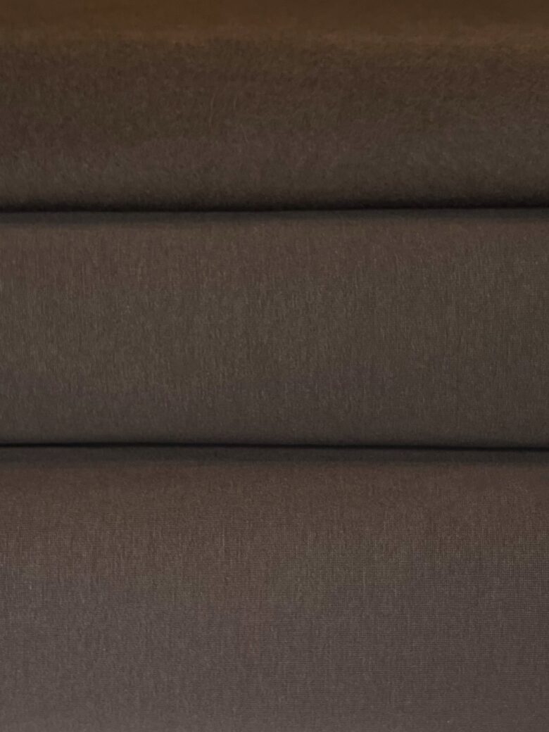 Double-sided looped fabric with fleece in brown color