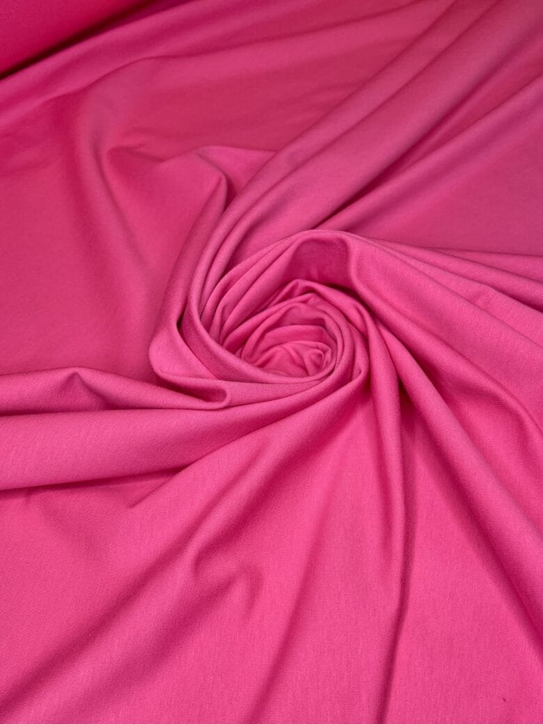 Double-sided loop knit fabric in bright pink color