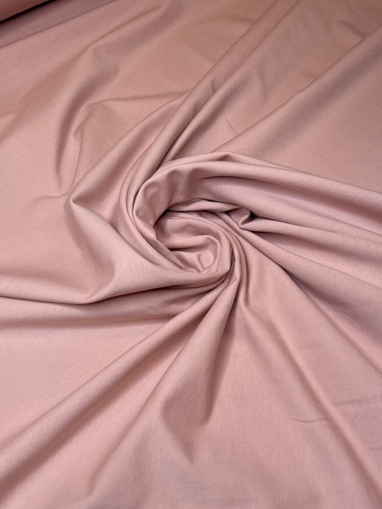 Double-knit looped jersey fabric in "Ash Pink" color