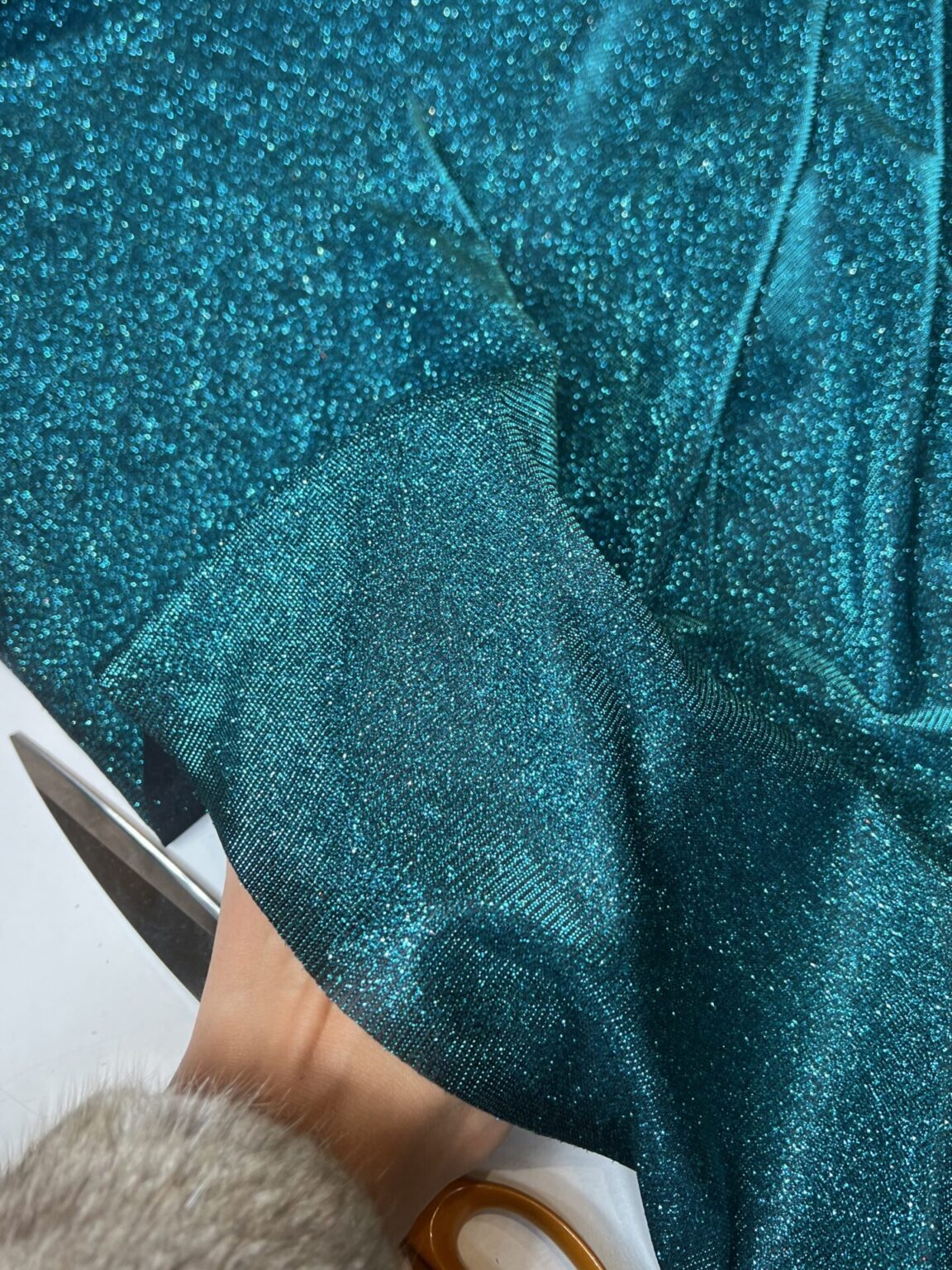 Glossy stretch fabric in water blue color