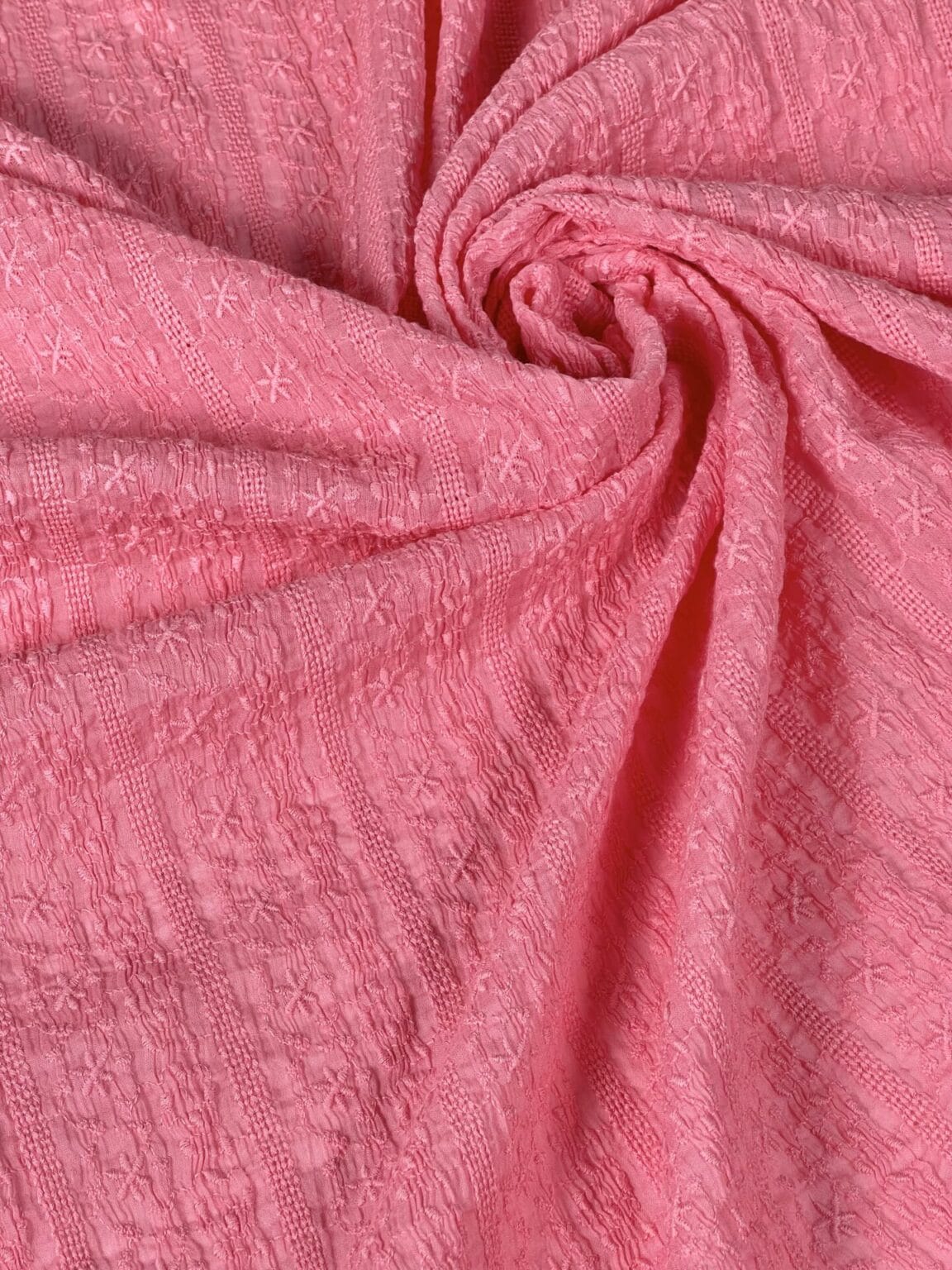 Embroidered cotton in light coral color