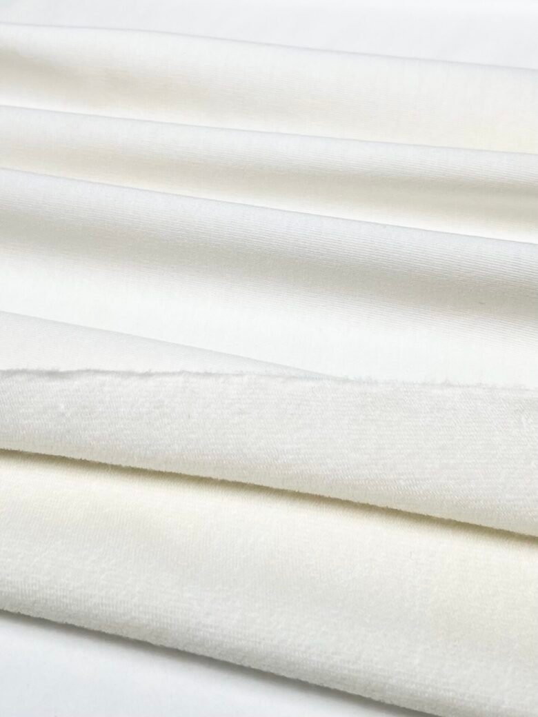 Merino vilnos ir liocelio elastingas dvisiūlis kilpinis trikotažas (premium kokybė) pieno baltos spalvos 004