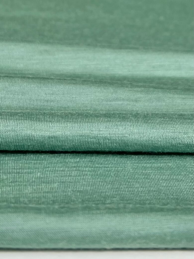 Merino vilnas elastīgs trikotažs (premium kvalitāte) gaiši zaļā krāsā 042