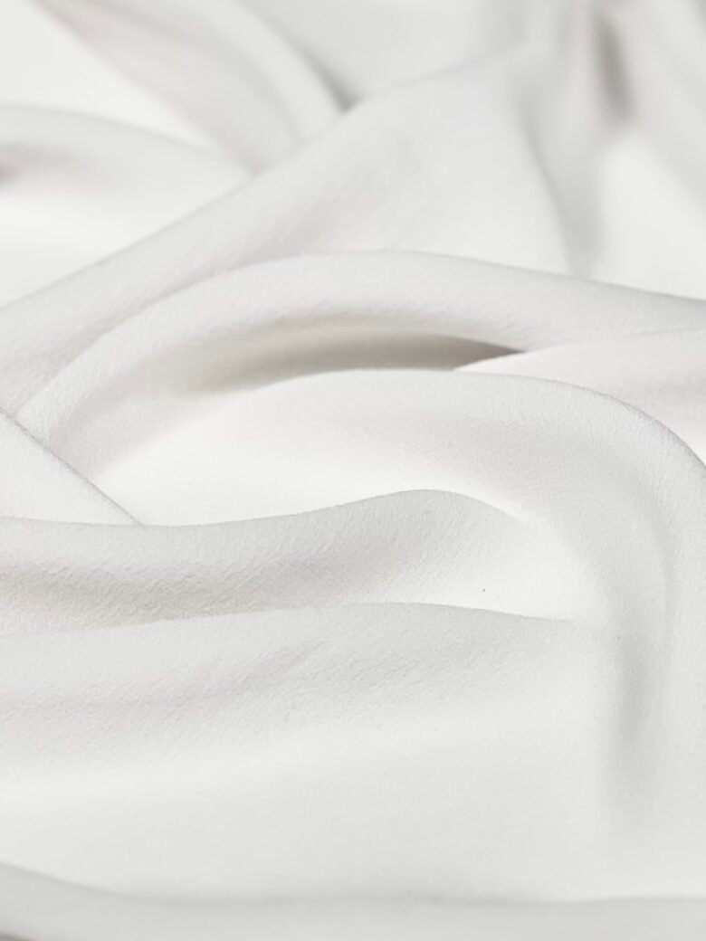 Italian collectible solid color natural silk chiffon with elastane in white color