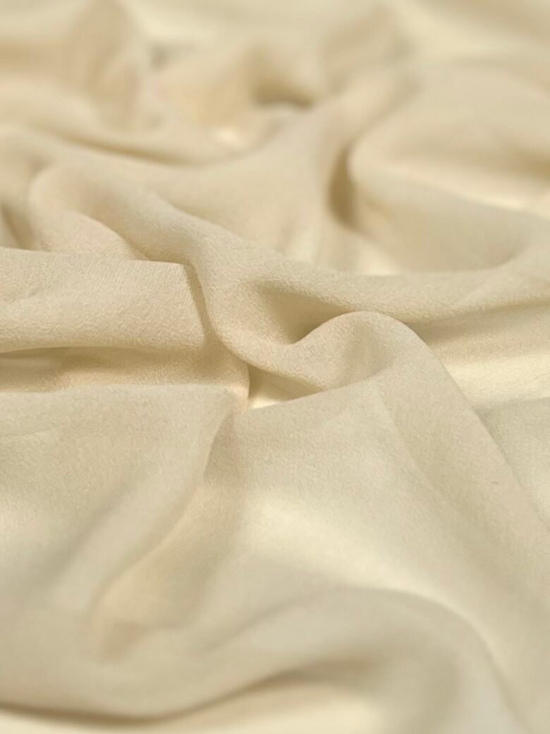 Italian collectible chiffon solid natural silk with elastane in ash yellow color