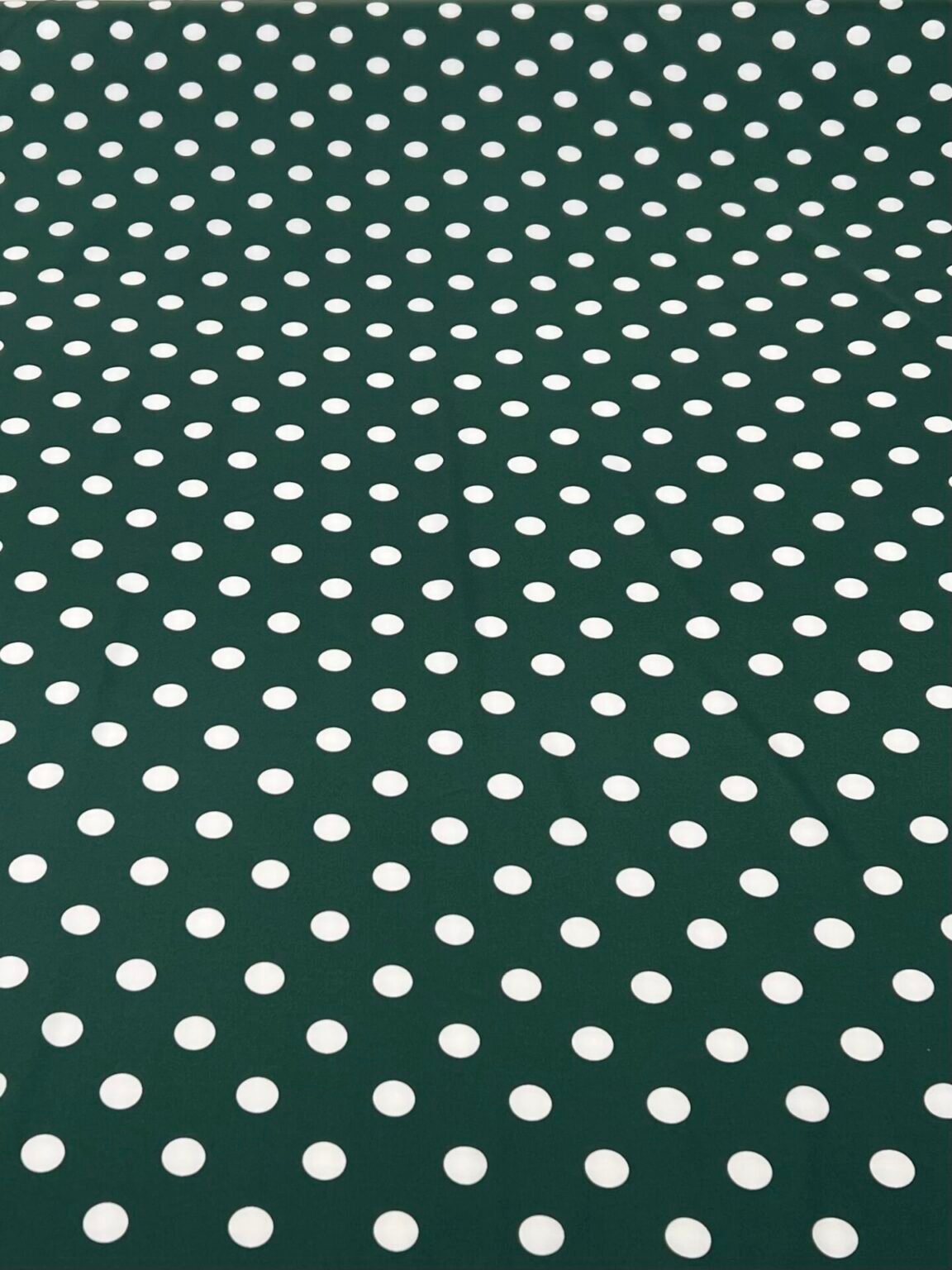 "Silky" dress fabric in emerald color with bubble pattern