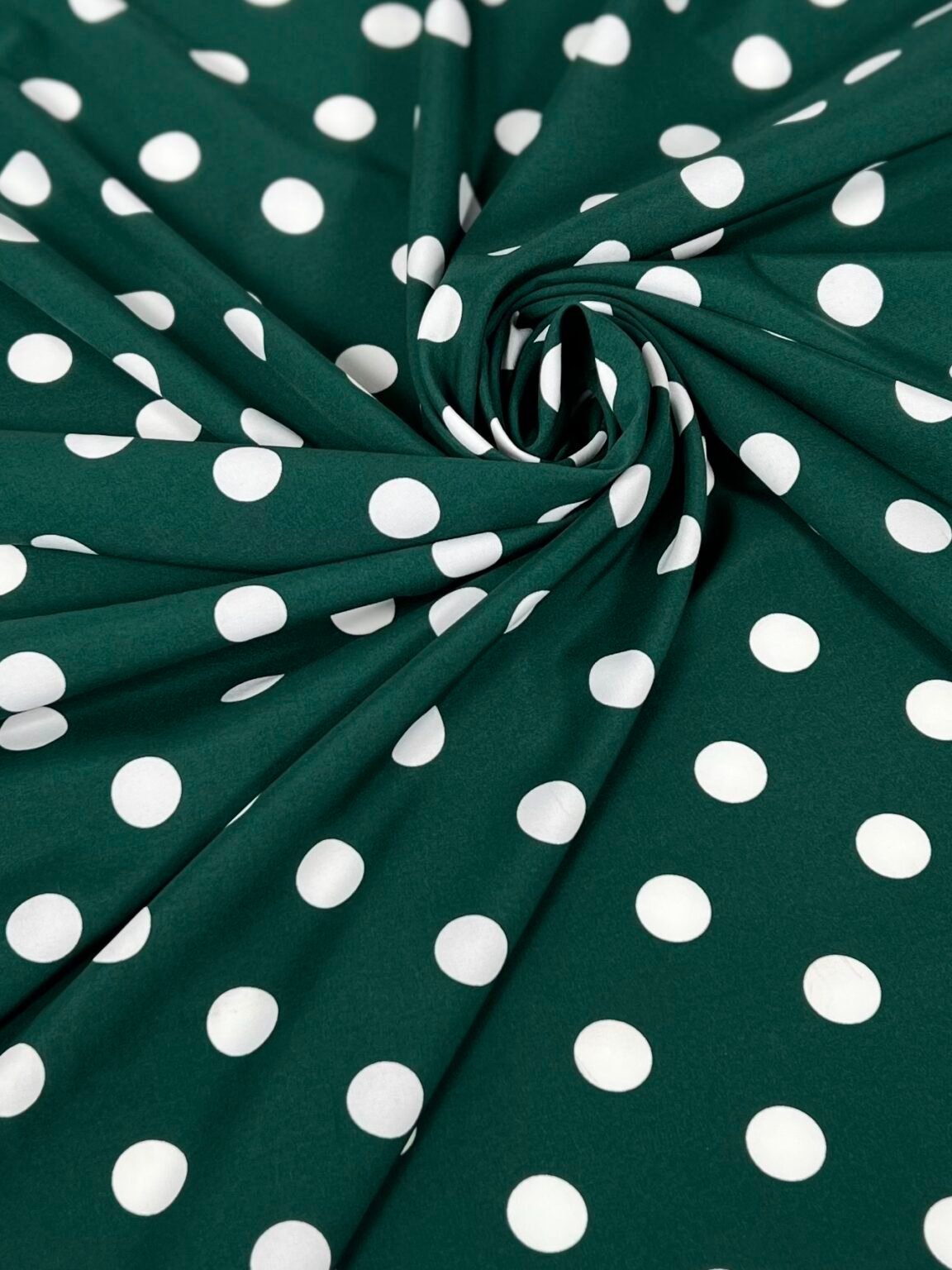 "Silky" dress fabric in emerald color with bubble pattern