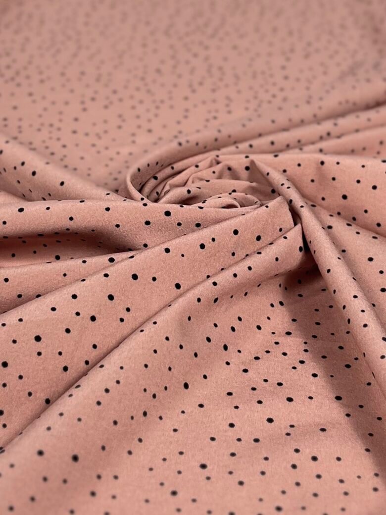 "Silky" dress fabric in a small polka dot pattern in ash pink color