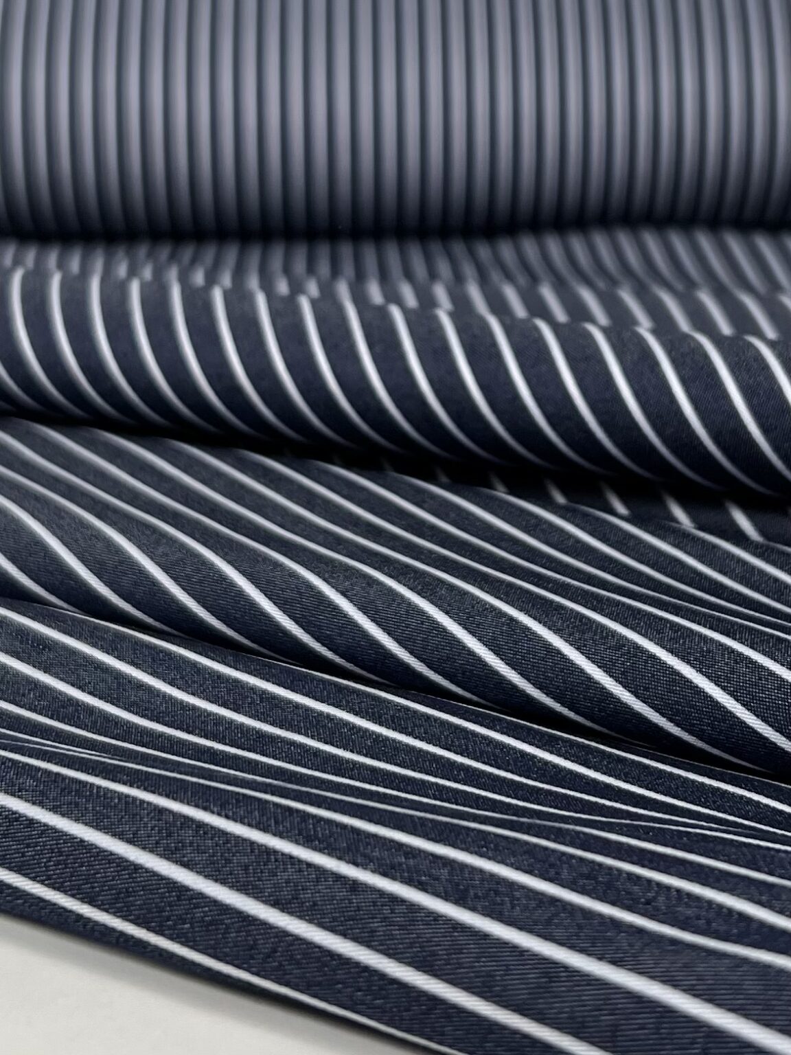 Dark blue striped viscose fabric for dresses and suits
