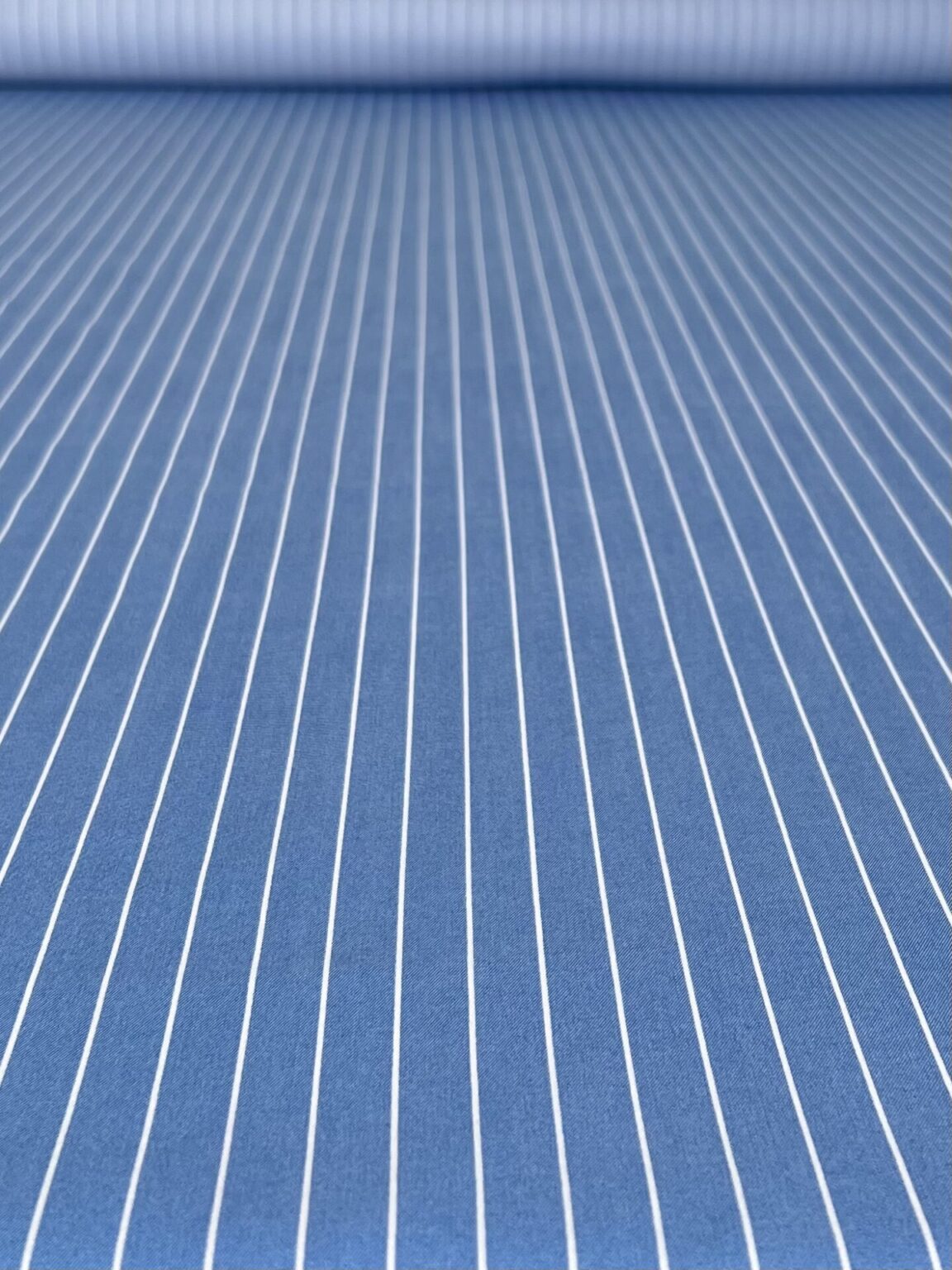 Light blue striped viscose fabric for dresses and suits